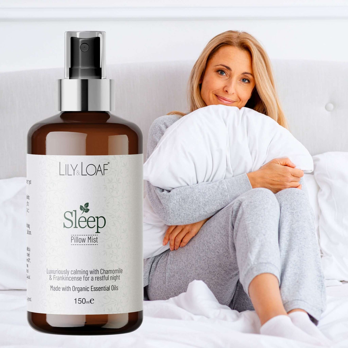 Bottle of Lily Loaf Sleep Room Mist with a woman holding a pillow in the background