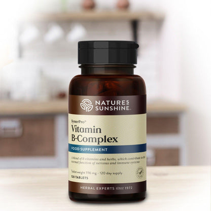 Bottle of Nature's Sunshine Vitamin B Complex on a kitchen counter