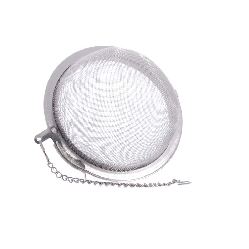 Metal tea ball infuser on a white background