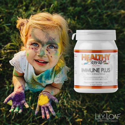 Girl playing with paint near Immune Plus supplement