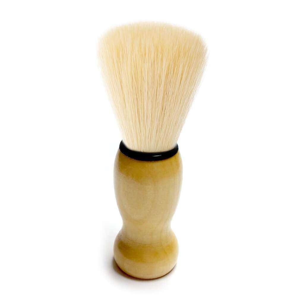 A shaving brush with a beige handle and white bristles, standing upright against a white background.