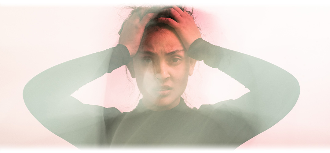 An image featuring a person with a worried expression. The image suggests the topic of anxiety and its impact