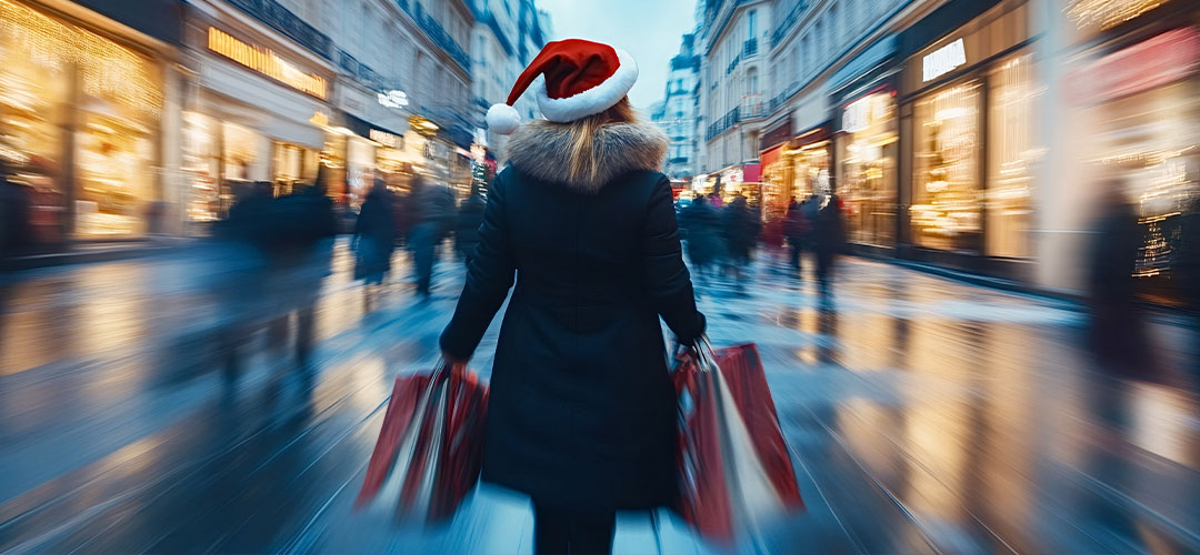 Lady in the high street at christmas overwhelmed