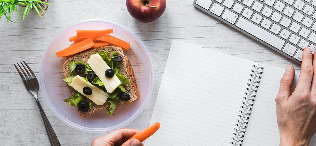 Healthy office snack olives carrots brown bread