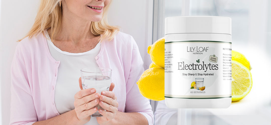 middle age lady drinking electrolytes