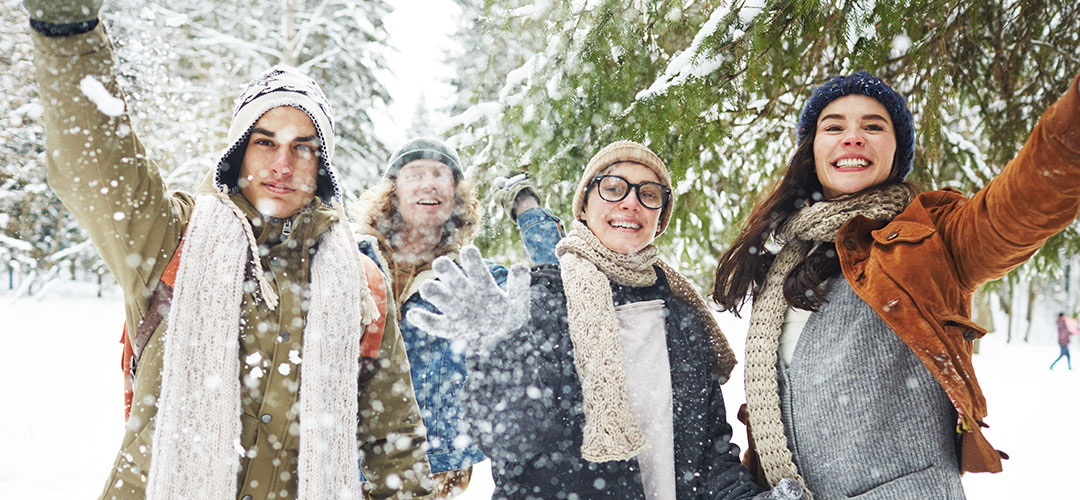 friends-playing-with-snow-vacation