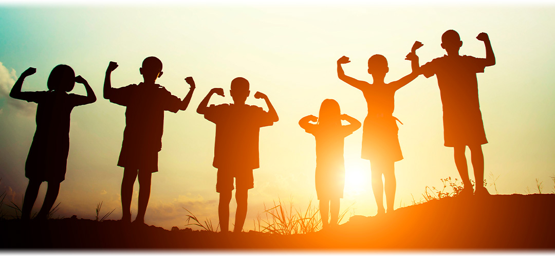 Children running and playing outdoors.