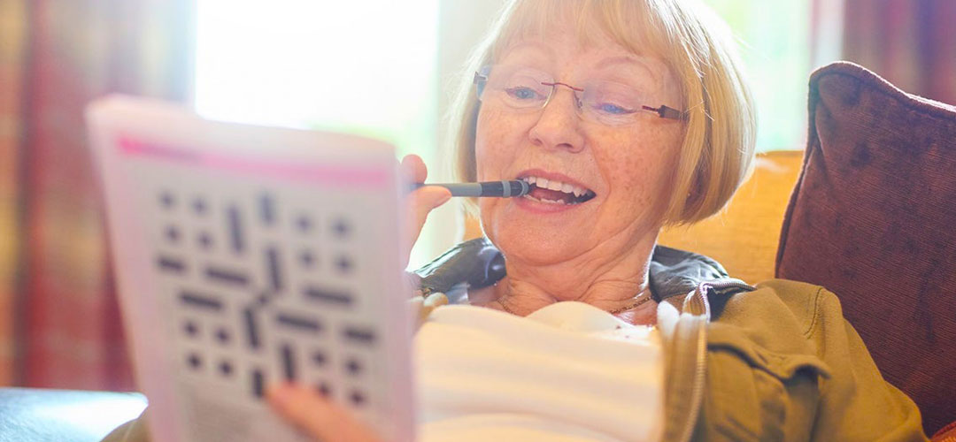 woman doing a crossword