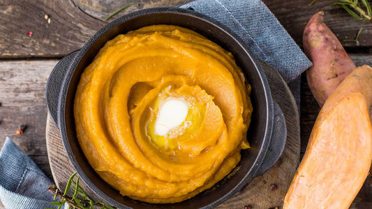 Creamy sweet potato mash served in a bowl with a smooth texture