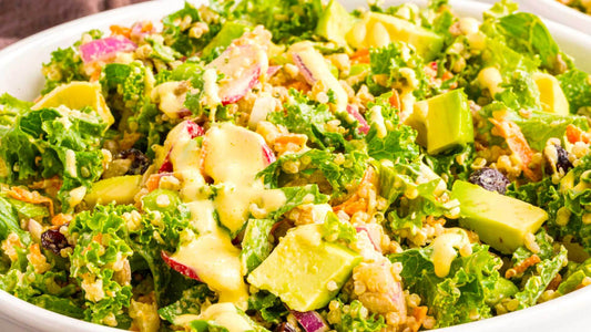 Superfood salad with kale, spinach, avocado, seeds and fresh vegetables