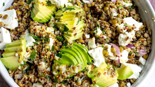 Lentil quinoa salad with avocado, feta cheese, cucumber and fresh mint