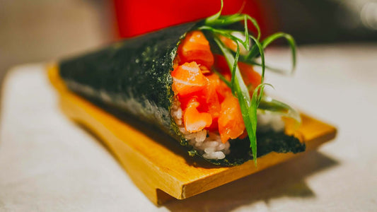 Nori wraps filled with smoked salmon, cucumber and carrot served with dipping sauce