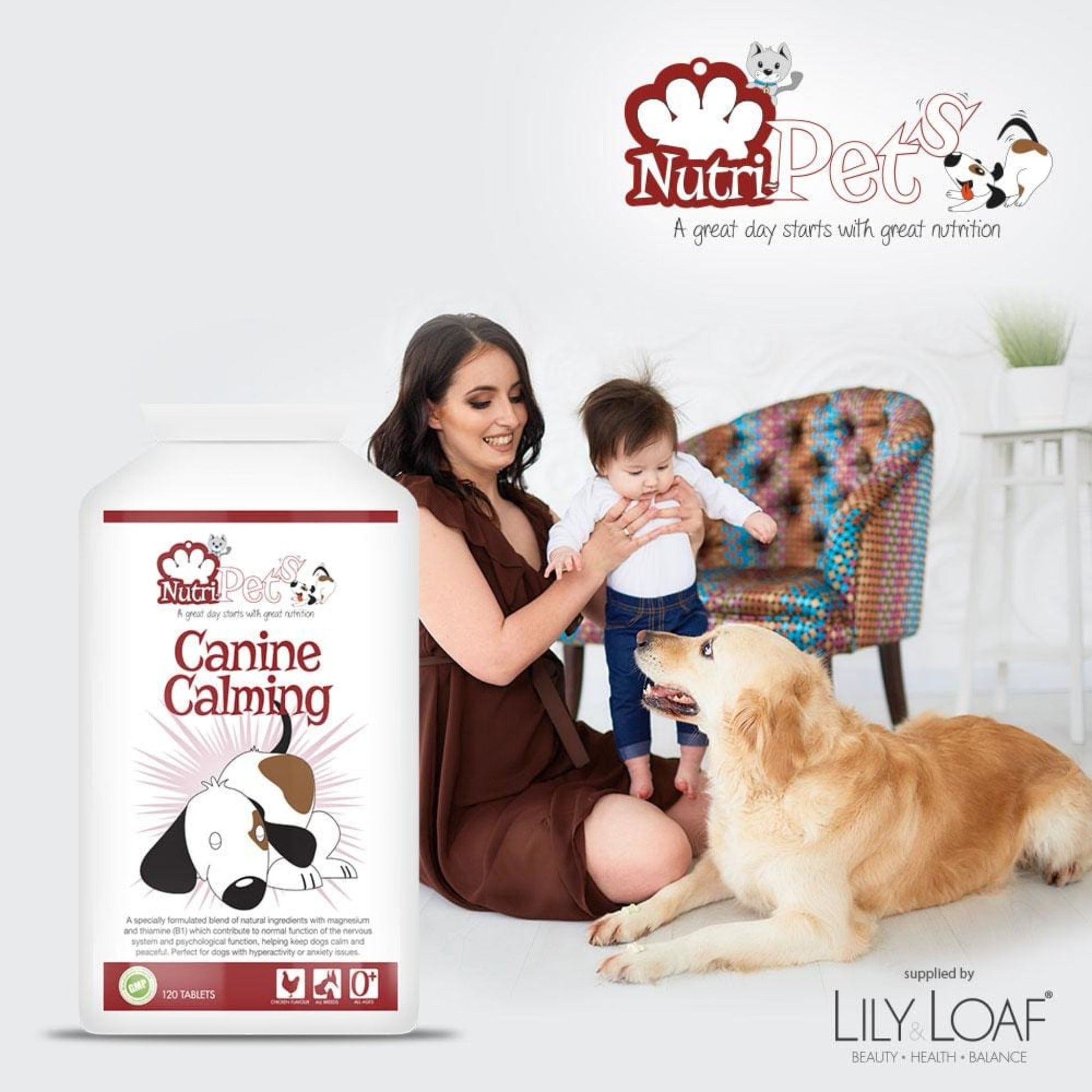 A woman holding a baby stroking a Labrador with a bottle of Nutri-Pets Canine Calming in the foreground