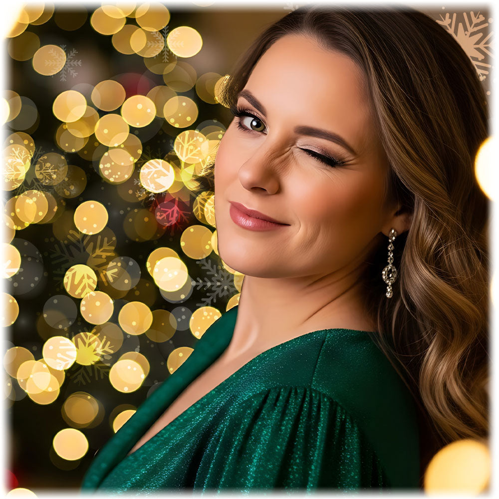 Woman in a green dress with a festive background of blurred lights and snowflakes