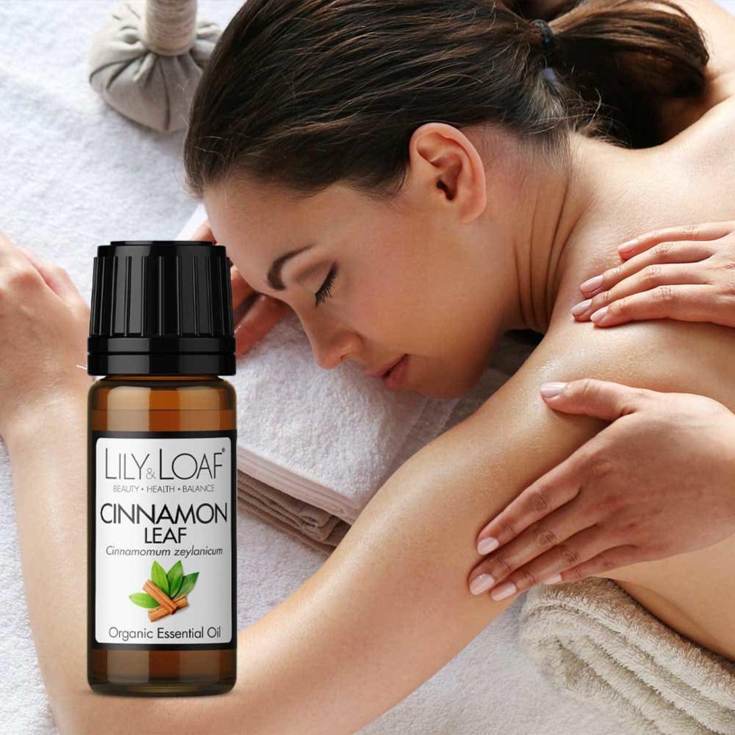 Cinnamon Leaf Organic Essential Oil A woman in a spa enjoying a massage
