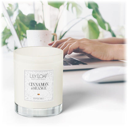 Lily & Loaf Cinnamon and Orange Soy Wax Candle on a home office desk