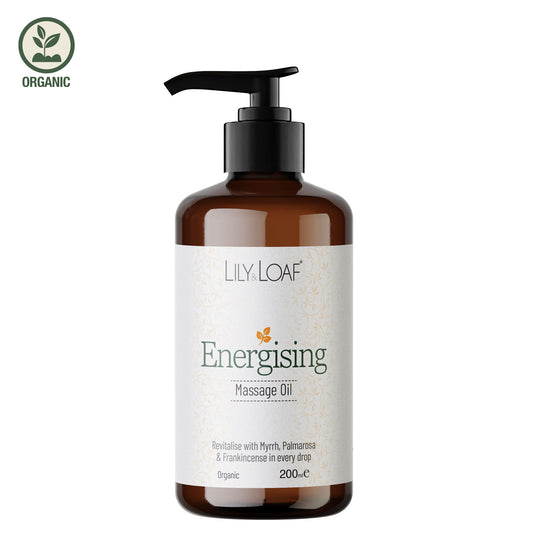 Brown bottle of Lily Loaf Energising Massage Oil on a white background