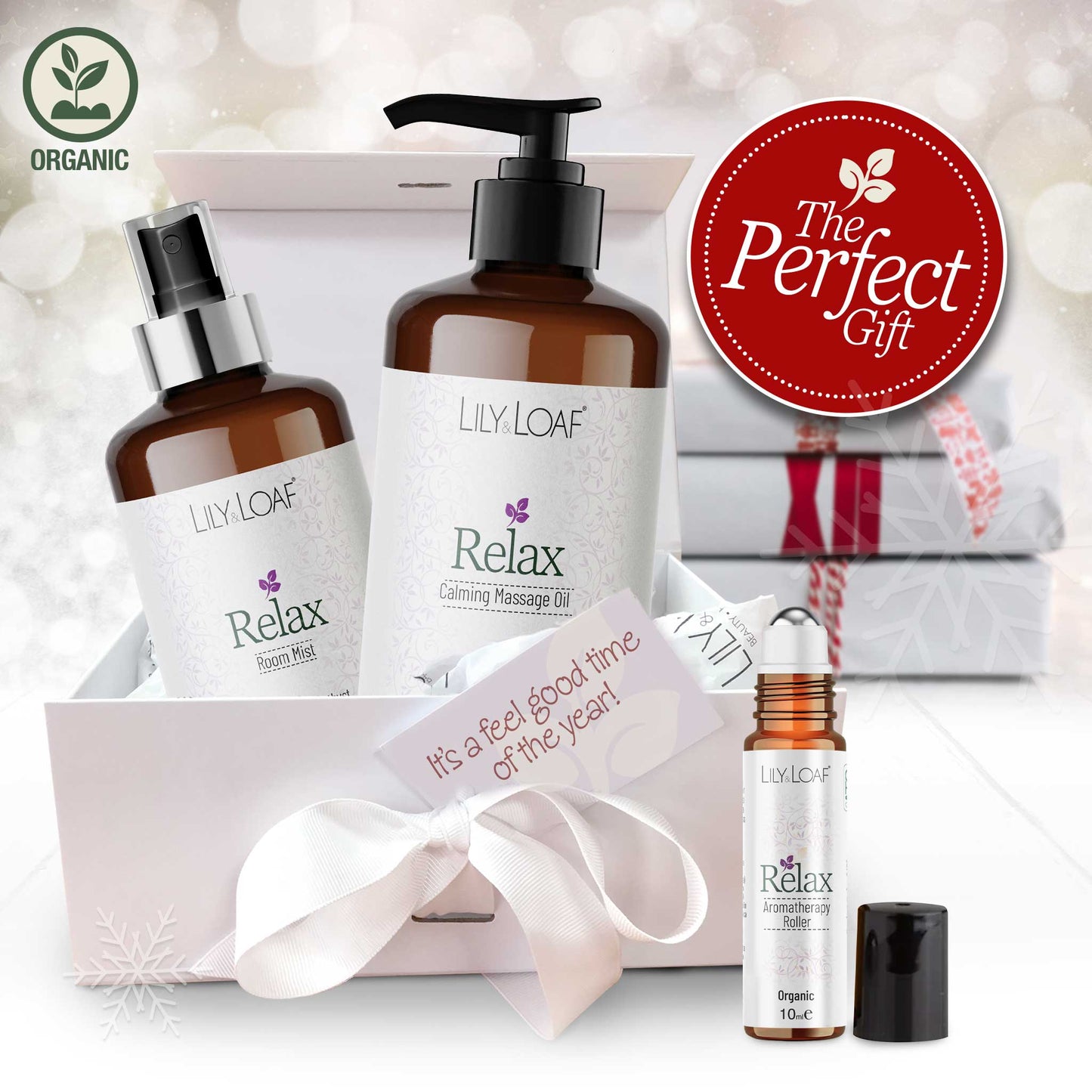 Lily & Loaf Relax Aromatherapy products with a gift box and decorative ribbon on a soft white background.