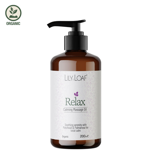 Bottle of Lily & Loaf Relax Calming Massage Oil on a white background
