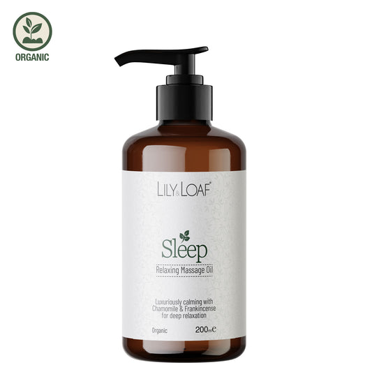 Bottle of Lily Loaf Sleep Relaxing Massage Oil on a white background