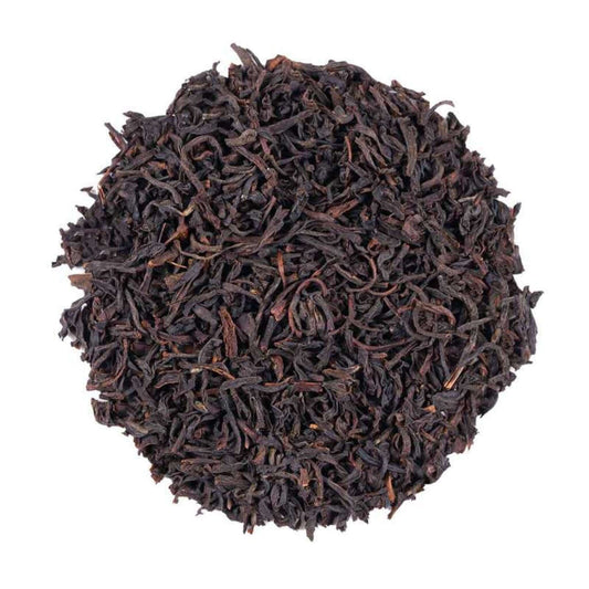 Close-up of loose-leaf Five O'Clock Afternoon Black Tea, displaying the dried ingredients and natural texture of the blend.