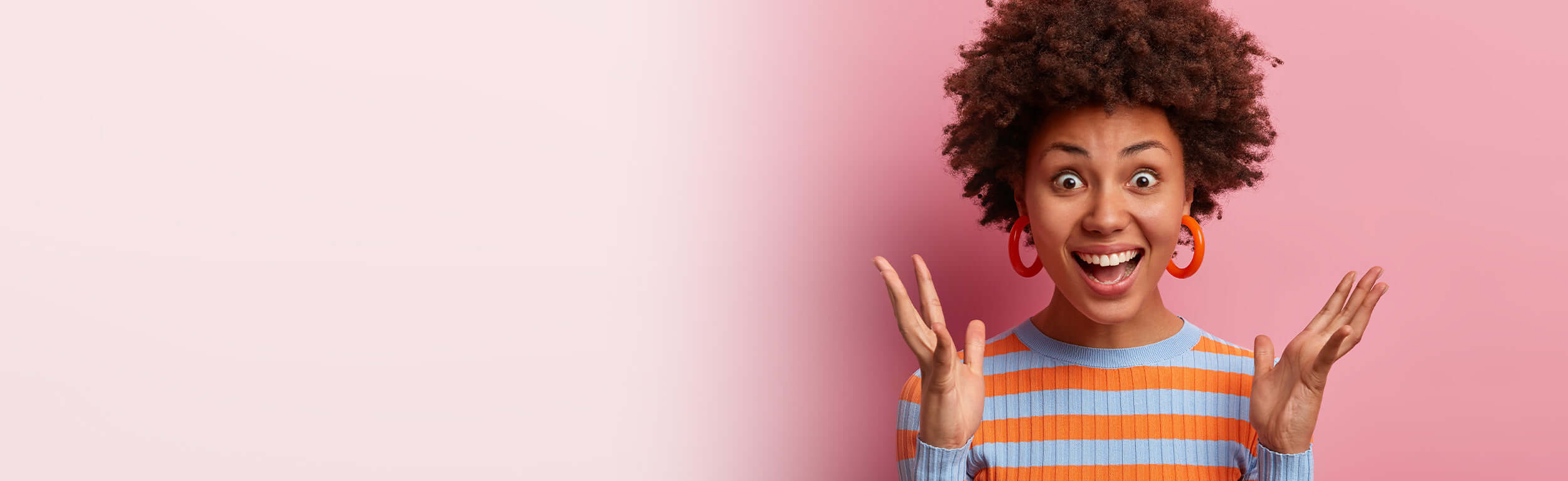 A woman with a surprised expression after finding out about special offers