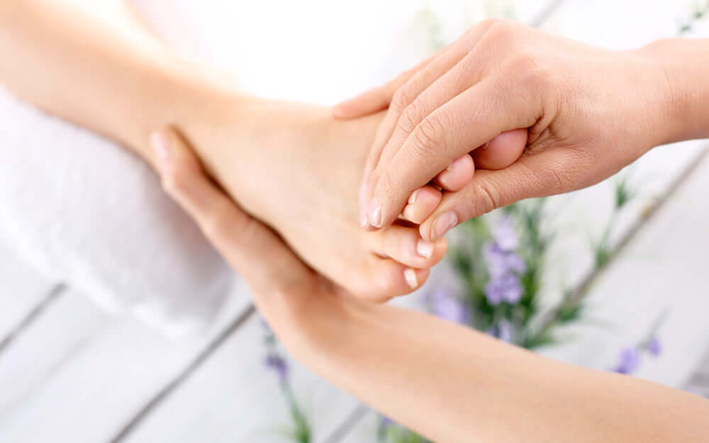 Collage of close-up hand and foot massages