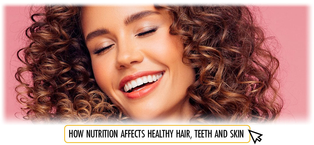 Radiant woman with curly hair, bright smile; Lily & Loaf links nutrition to hair, teeth, and skin health.