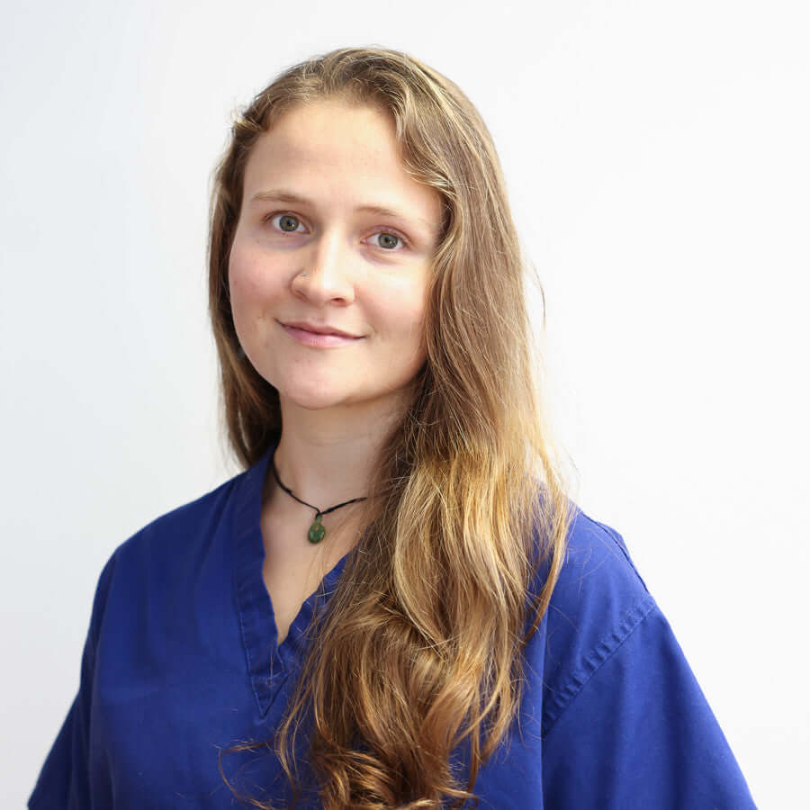 Dr Joanna Taylor, nutrition expert, smiling in a professional headshot against a white background