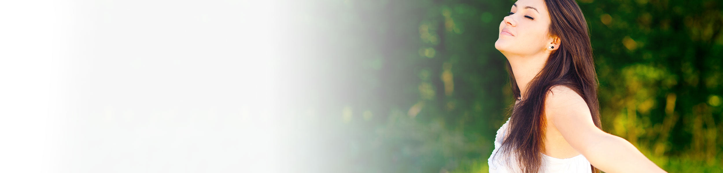 A woman enjoying a walk in a forest