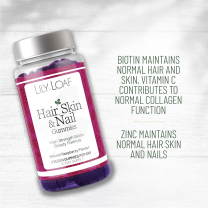 Bottle of Lily & Loaf Hair, Skin & Nail Gummies with product facts on a light grey background