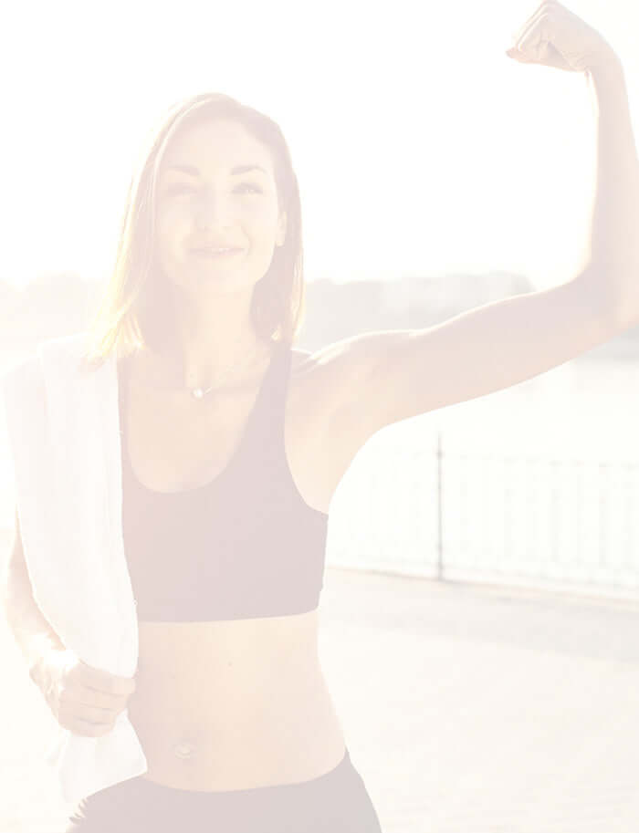 lady flexing arm showing strength