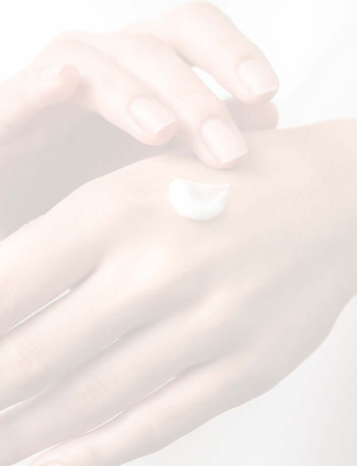 Luxury hand creams being massaged into hands