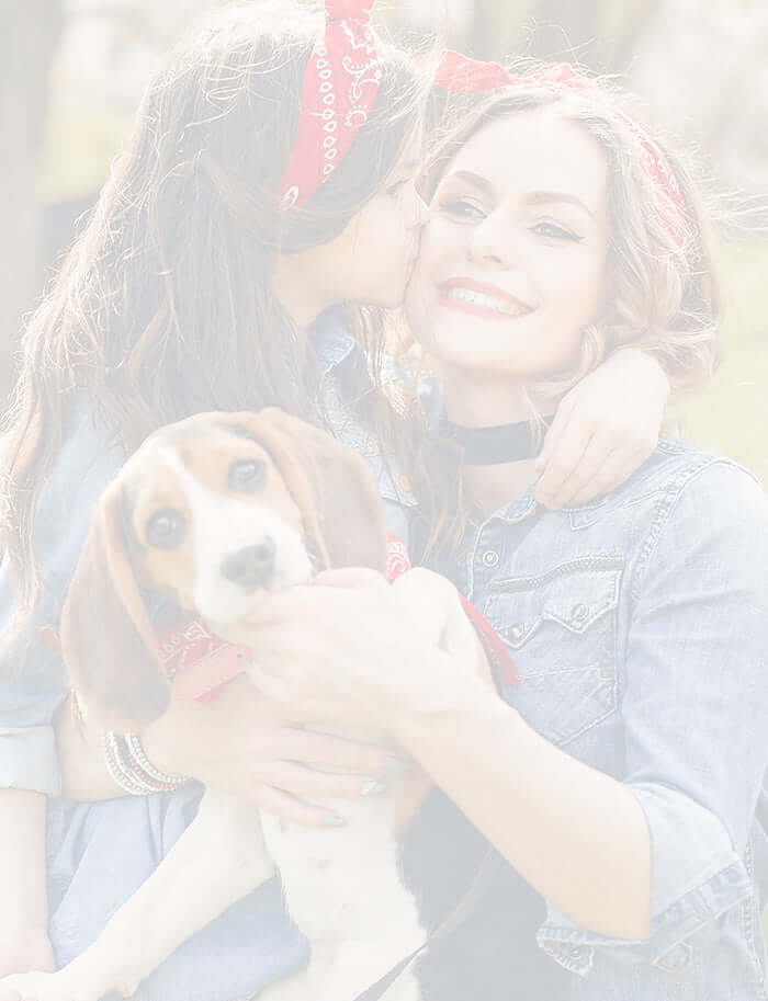 mom and daughter with there dog