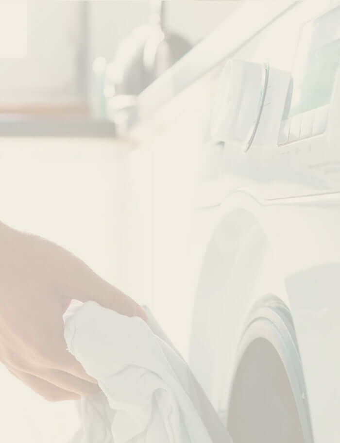 placing a towel into washing machine