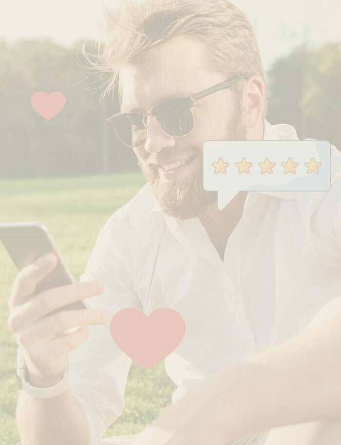 A man looking at his phone with  cartoon love hearts and stars overlaid