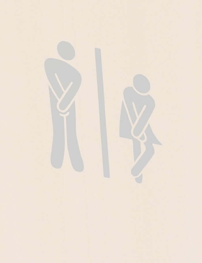 male and female toilet signs on a door