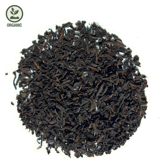 Close-up of loose-leaf Morning Cuppa Organic Black Tea, displaying the dried ingredients and natural texture of the blend.