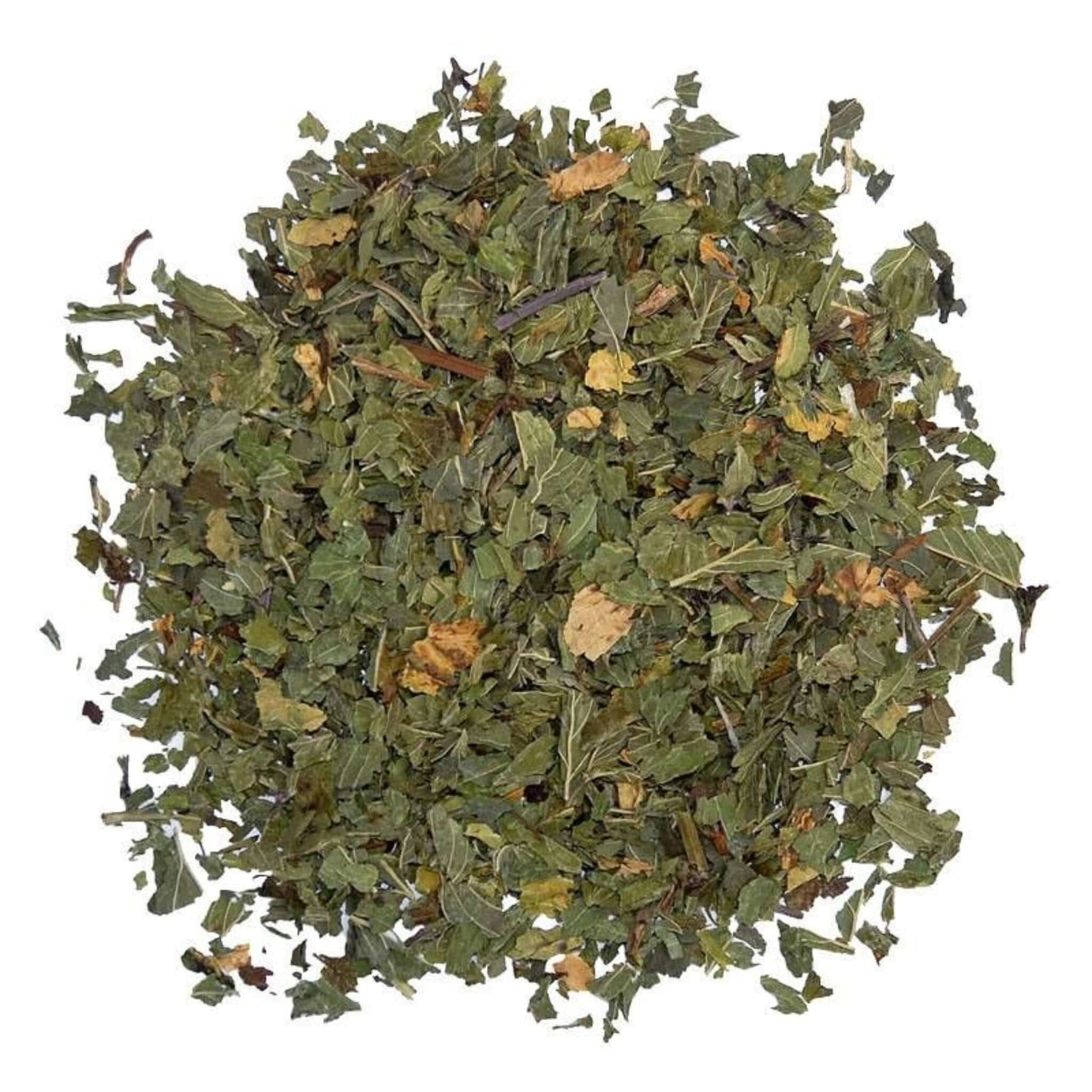 Close-up of loose-leaf Peppermint Herbal Tea, displaying the dried ingredients and natural texture of the blend.