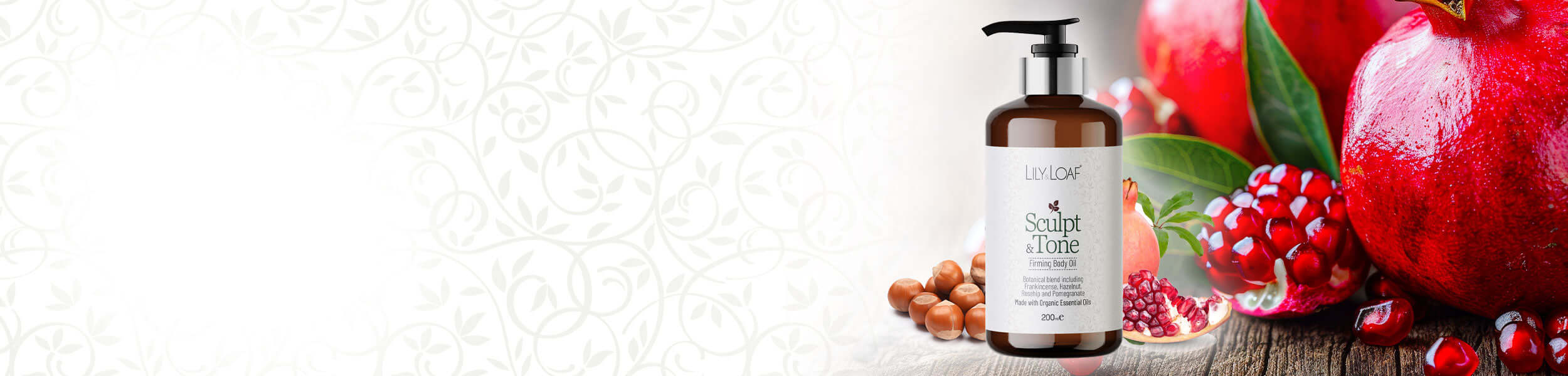 Sculpt & Tone Firming Body Oil product with pomegranate and hazelnut on a white background
