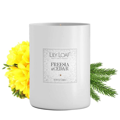 Freesia & Cedar Soy Wax Candle with ingredients behind