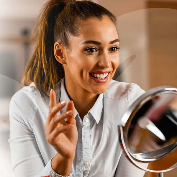 Woman using a smartphone with a blurred office background