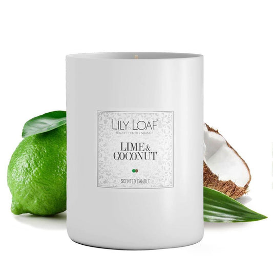 Lily & Loaf Lime & Coconut Soy Wax Candle with lime and coconut at the base