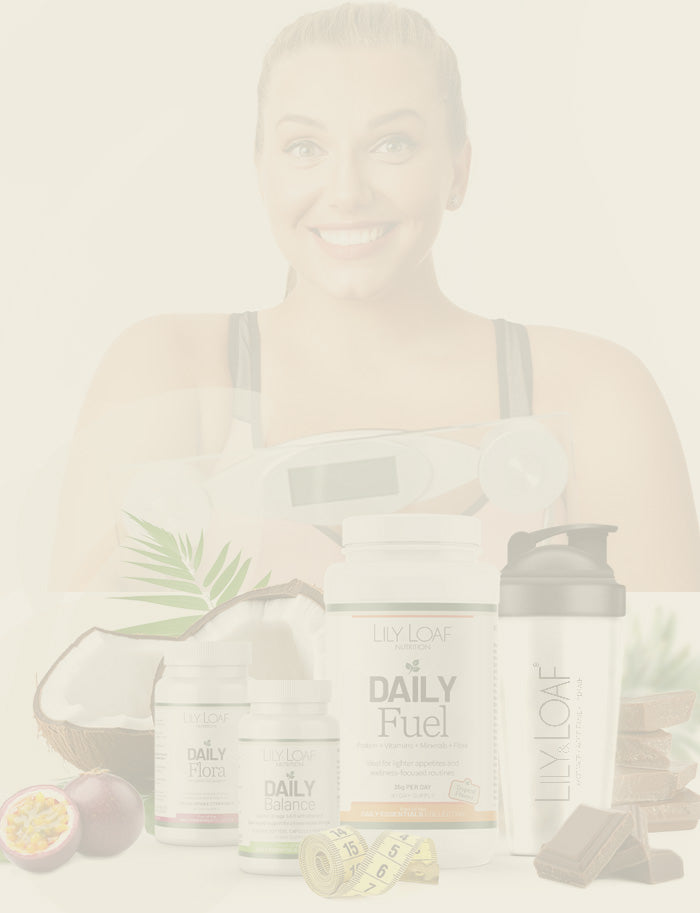 Woman holding 'The Daily Essentials' products with a blurred background