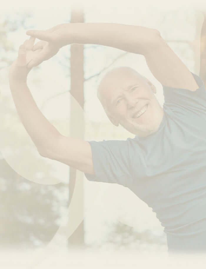 Person stretching outdoors with a blurred background