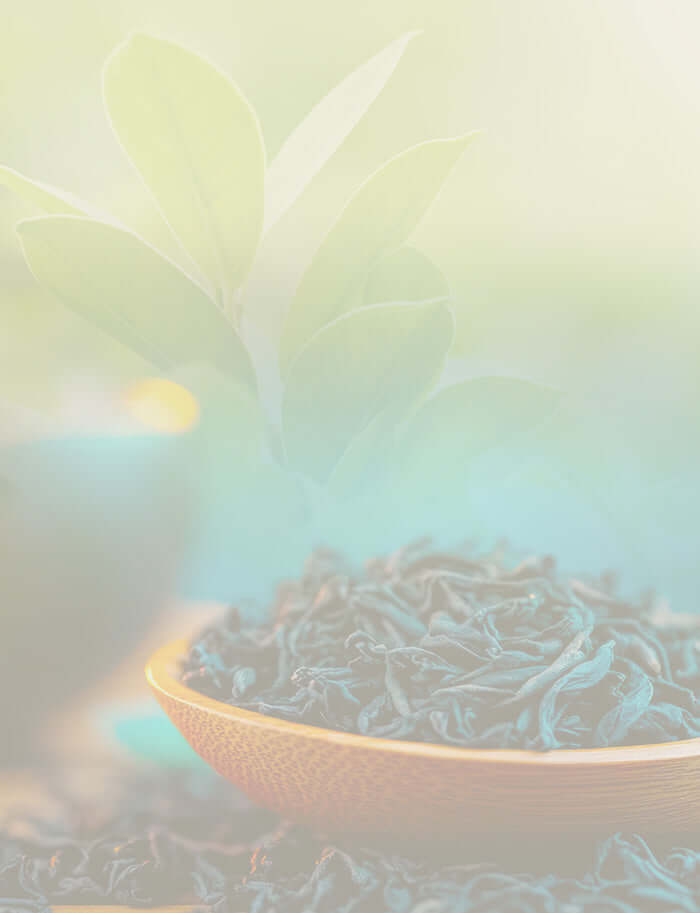 Bowl of tea leaves with a soft, blurred background