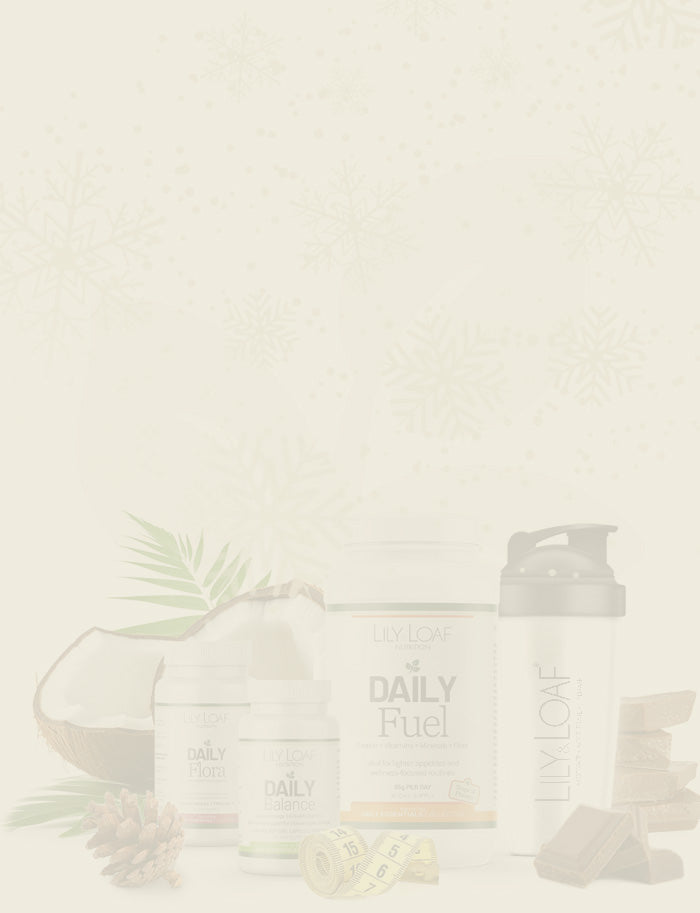 Festive mobile banner featuring Lily & Loaf Daily Essentials products with coconut, shaker bottle and chocolate on a soft snowy background