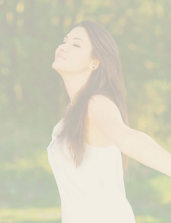 A woman relaxing in a forest