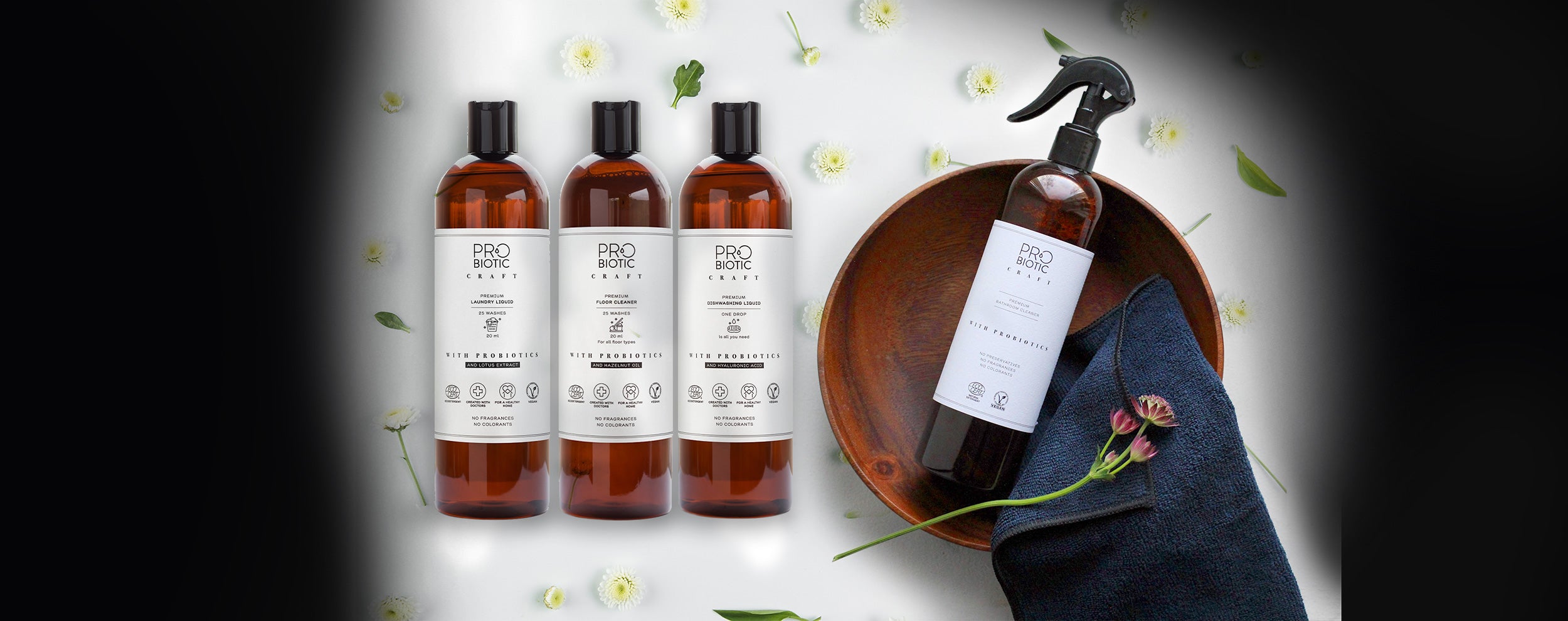 Probiotic Craft household cleaners by Lily & Loaf arranged elegantly with flowers, promoting a natural and effective clean.