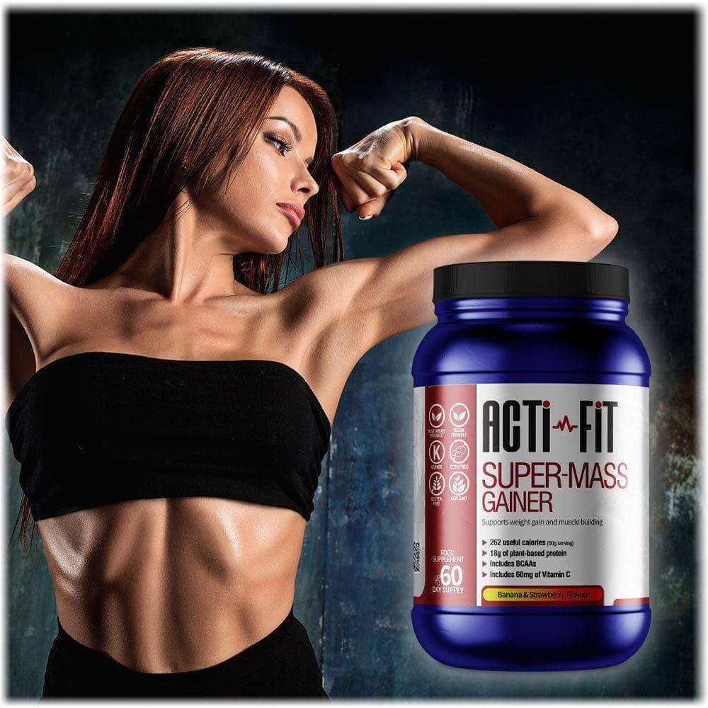 Woman flexing arm beside Acti-Fit Super-Mass Gainer tub, highlighting a high-calorie protein formula designed to support muscle mass and weight gain.